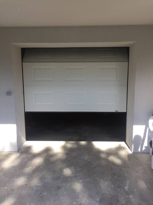Faire installer une porte de garage sectionnelle sur-mesure près de Lyon